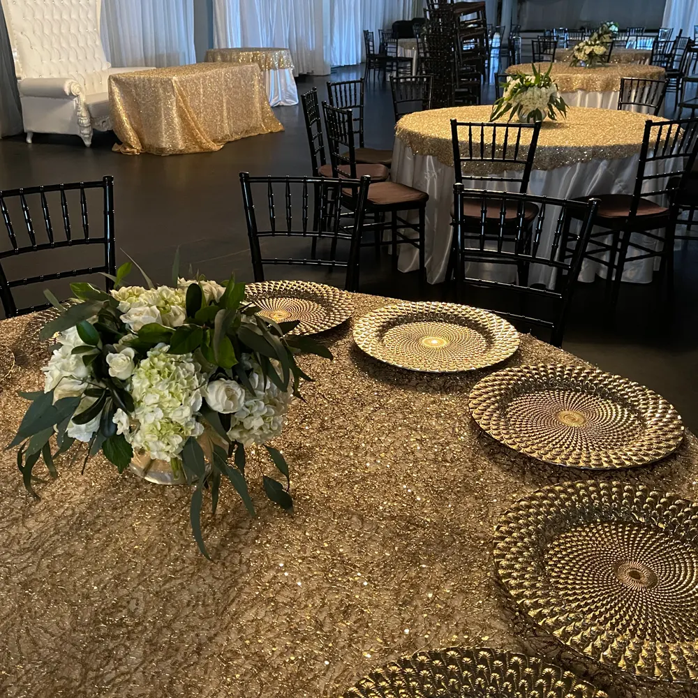 Rustic wedding table setting with floral accents and wooden platters